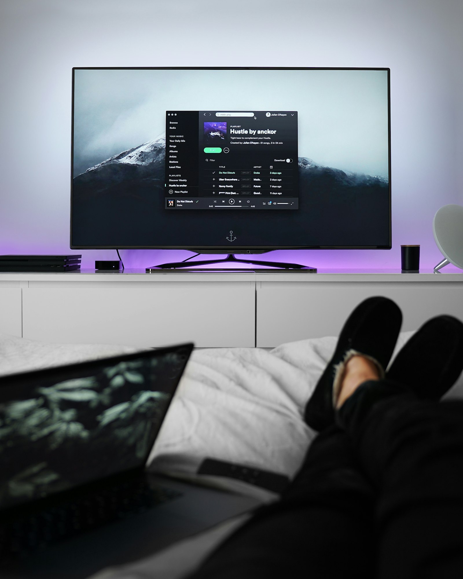 A flat-screen television set up in a modern Brussels living room