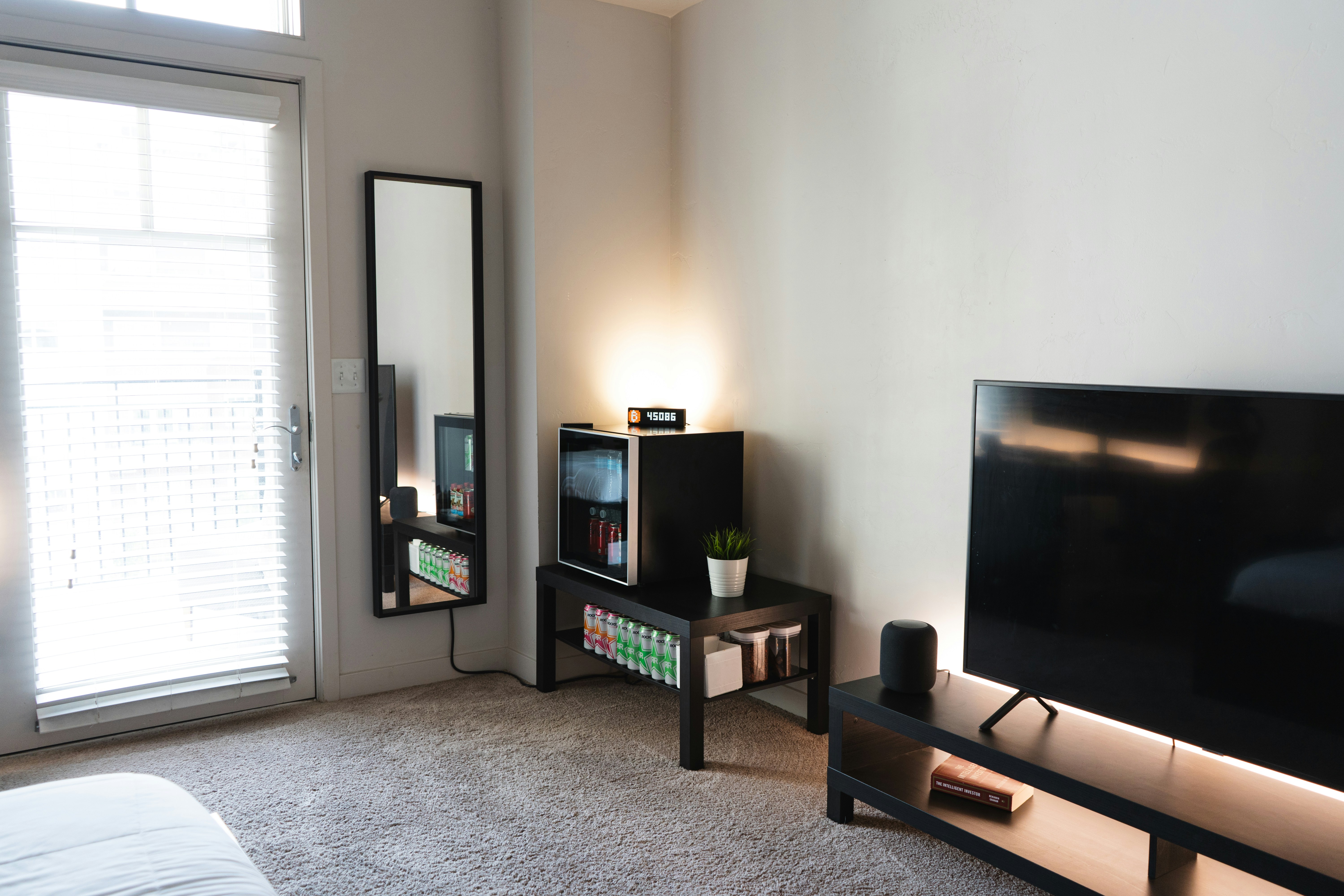 Smart television in a modern living room displaying a streaming interface